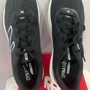 New Balance Men's Black and White Sneakers